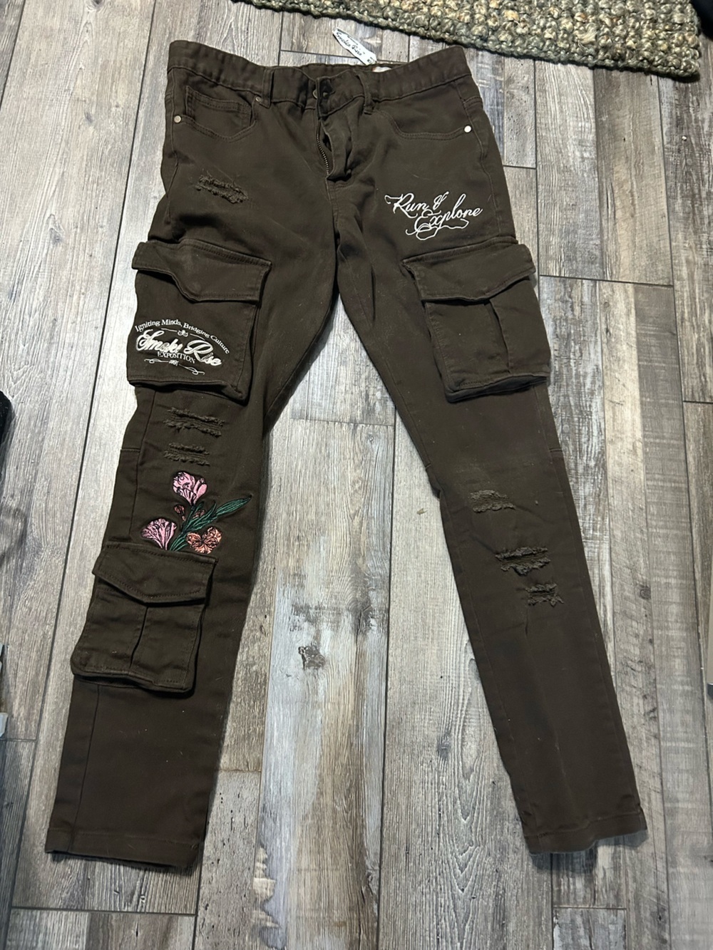 brown Smoke Rise cargo pants featuring floral embroidery and distressed